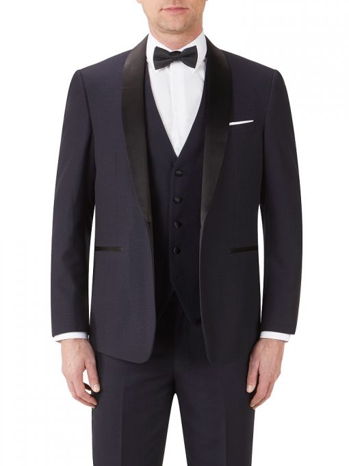 Full navy suit with a navy dicky bow modelled on a man