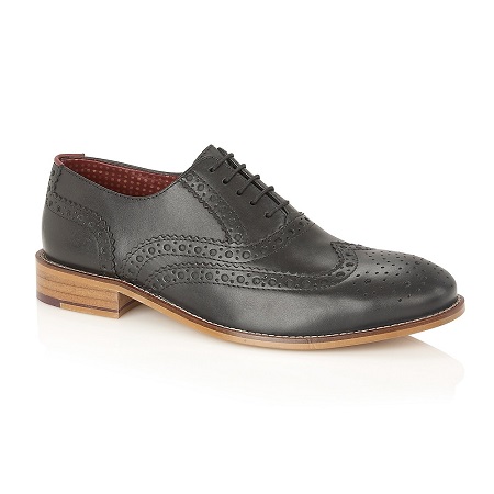 Black brogues with tan sole
